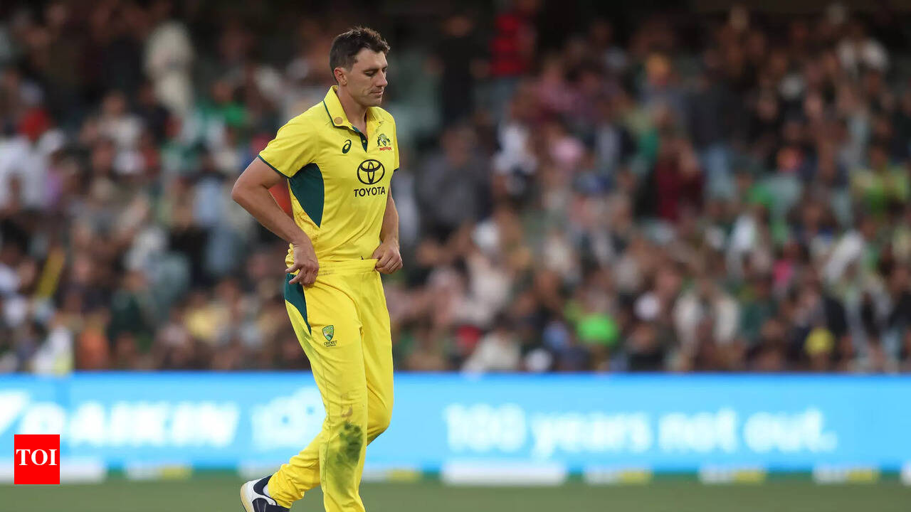 Pat Cummins bowling against India