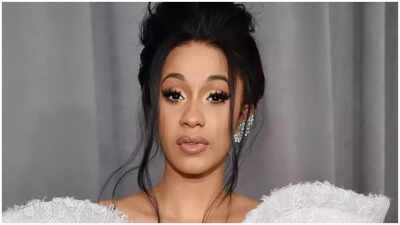 Cardi B throws pen at paparazzo asking about pregnancy outside court in viral video after winning civil assault lawsuit