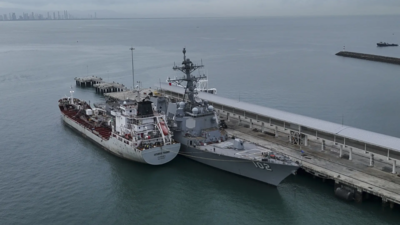  Venezuelan F-16 fighter jets fly over US navy ship days after American strike on boat; tensions escalate