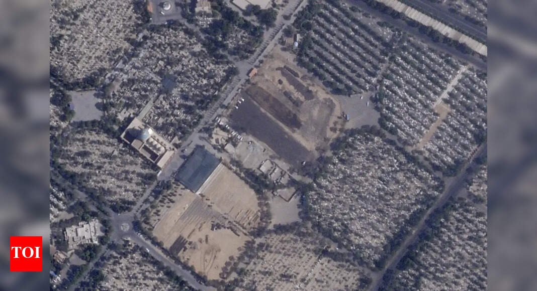 Iran turning Islamic Revolution burial site into parking area; satellite images show paving Iran turning Islamic Revolution burial site into parking area; satellite images show paving
