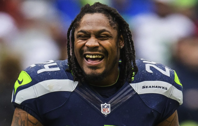 Marshawn Lynch stuns fans by showing up as sideline photographer in Brazil