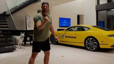 Bryson DeChambeau reacts in disbelief as fans crash site during luxury Bentley giveaway prize contest