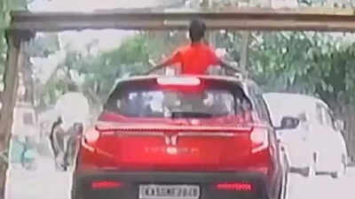 'Sunroofs are not meant for standing': Boy pops out of moving car in Bengaluru; hits overhead barrier