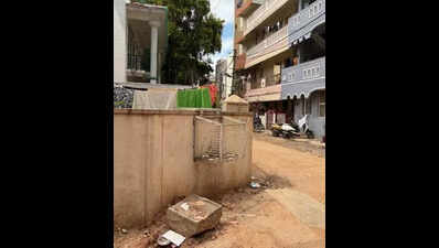 Bengalureans put garbage in wall-mounted cages as collection falters