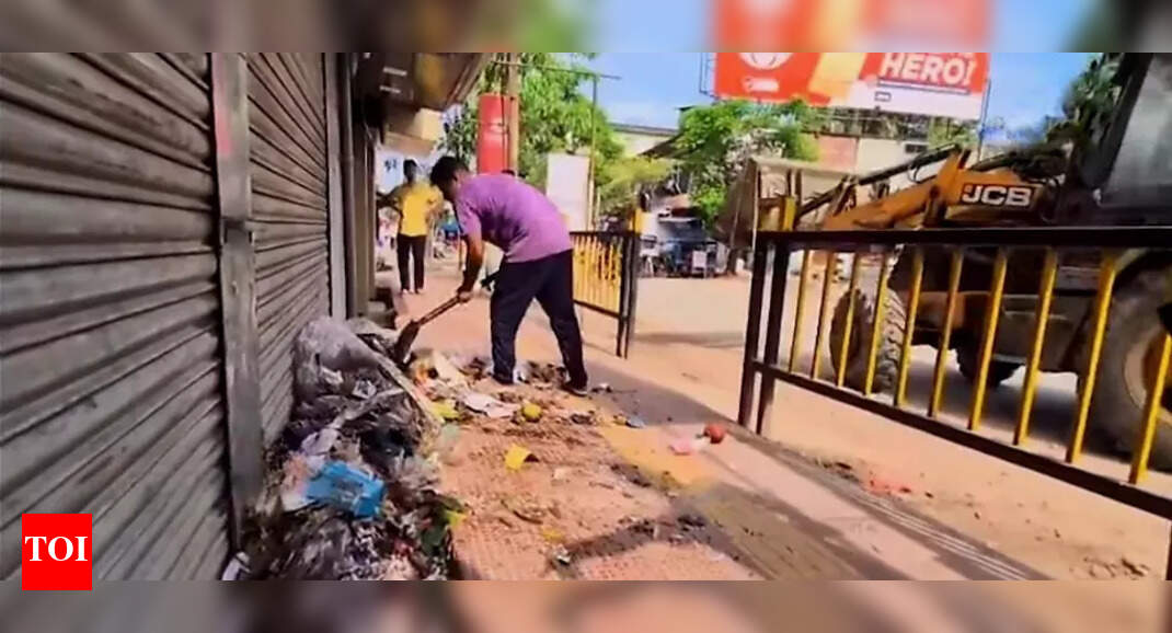 Tinsukia municipal workers take innovative action against illegal dumping by returning waste to offending shop