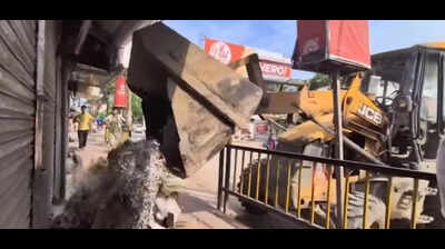 Tinsukia municipal workers take innovative action against illegal dumping by returning waste to offending shop