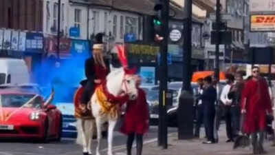  People stop to watch groom ride decorated horse – Watch