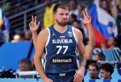 NBA fans can't get over Luka Doncic's casual half-court shot vs Germany at EuroBasket 2025