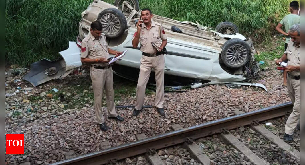 Car plunges from flyover onto railway tracks in Delhi; train services halted
