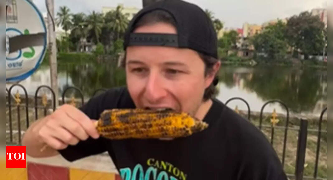 Viral: Foreign vlogger tries Indian-style roasted corn on the cob, netizens love his reaction