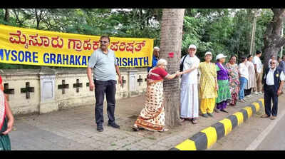 Activists protest use of trees to illuminate city during Dasara