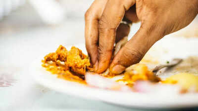 Why eating with your hands could be the natural cure for bloating and slow digestion