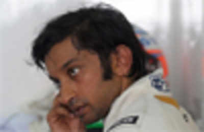 Karthikeyan qualifies for Malaysian GP; Force India 14th and 16th
