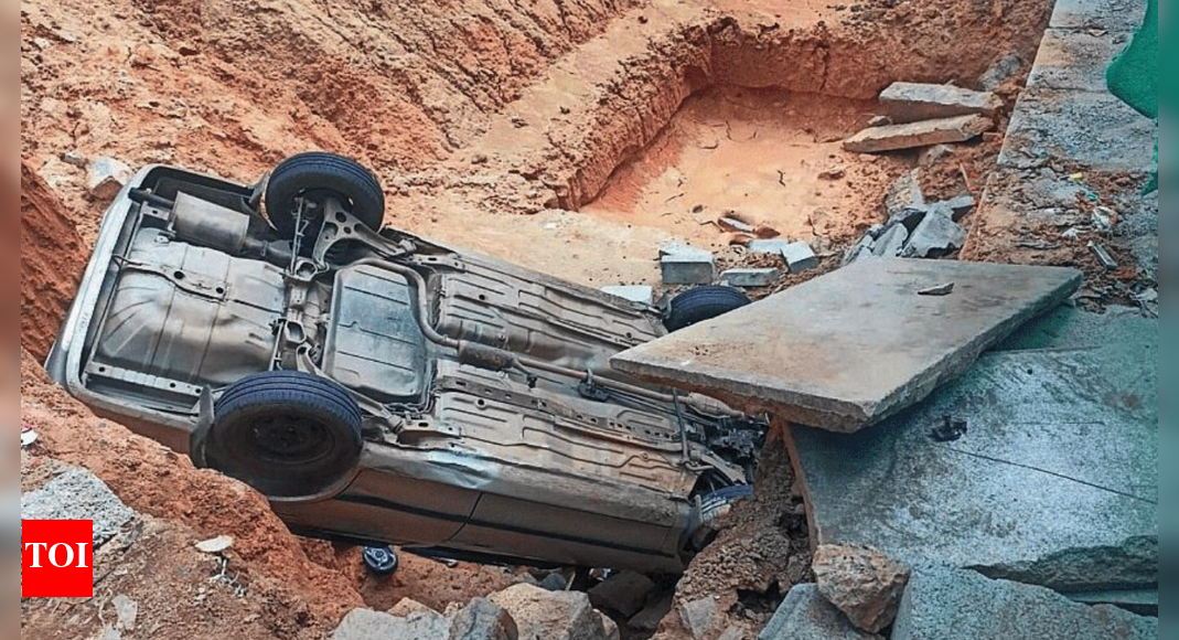 ‘Accident waiting to happen’: Sedan topples into 25-foot open pit in Bengaluru