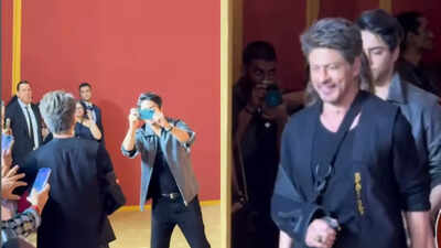 Shah Rukh Khan poses with the paparazzi, burying the hatchet; Aryan Khan captures the moment, netizens react – WATCH VIDEO