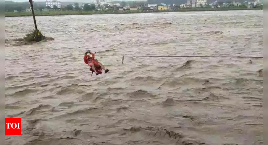 Dehradun floods: Farmer clings to 50m pole for 5 hours above raging river