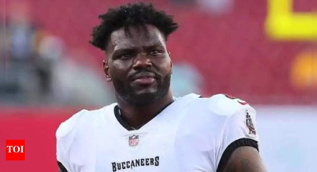 Shaquil Barrett caught off guard as flying baby poop sends him flipping