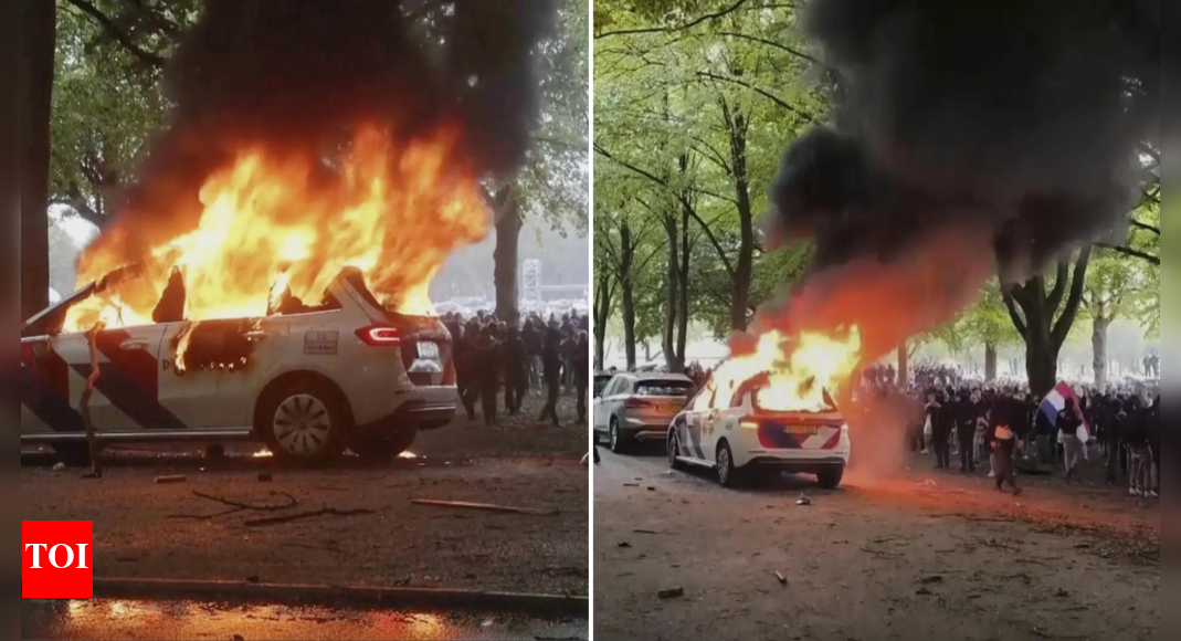 30 arrested, officers hurt: Far-right protesters torch police car, attack party HQ in The Hague - Here's what happened