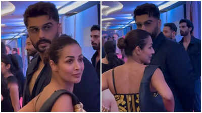 Exes Arjun Kapoor and Malaika Arora share a rare post-breakup reunion, hugging and greeting each other at Homebound premiere
