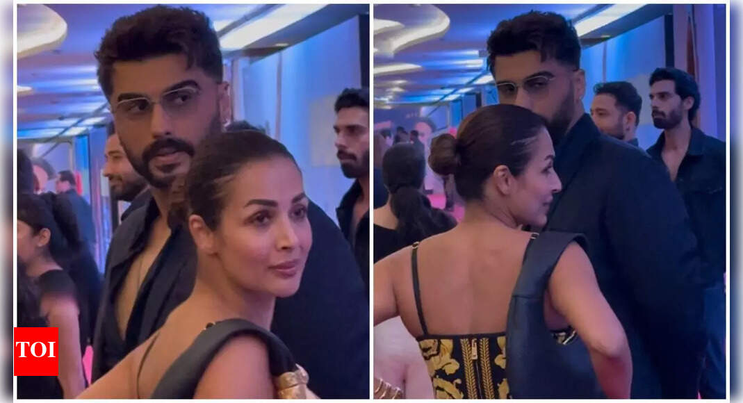 Arjun and Malaika hug each other at Homebound premiere