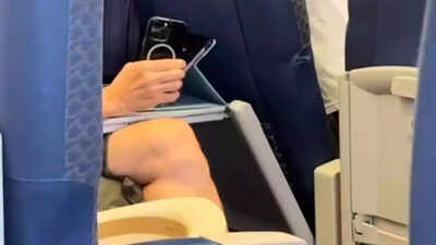 Woman catches man taking zoomed-in pictures of her on train-- This is what happened next