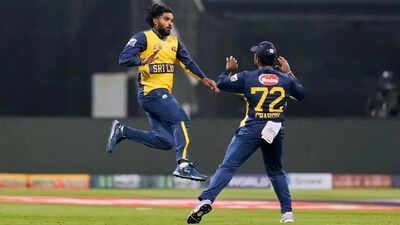 Catch of the Asia Cup! Wanindu Hasaranga takes one-handed worldie to dismiss Fakhar Zaman – watch video | Cricket News – The Times of India