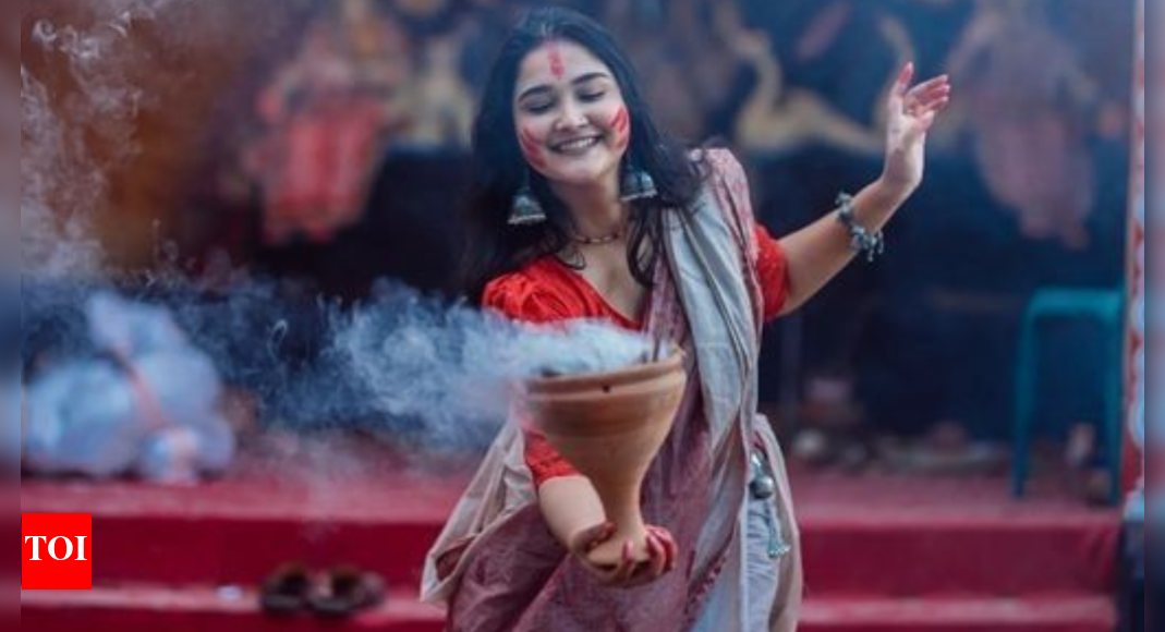 How to drape the traditional Bengali Lal-par sada saree for Durga Puja 2025