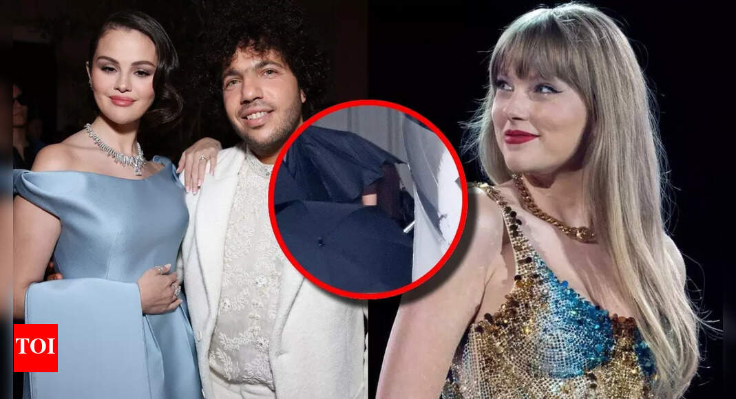 Could Taylor Swift be Selena Gomez’s maid of honor? Pop star sneaks ‘mystery white box’ into wedding weekend under an umbrella shield as Travis Kelce stays out of the scene