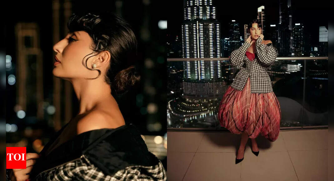 Nora Fatehi steals the show at Rahul Mishra’s Dubai showcase in a plaid corset gown