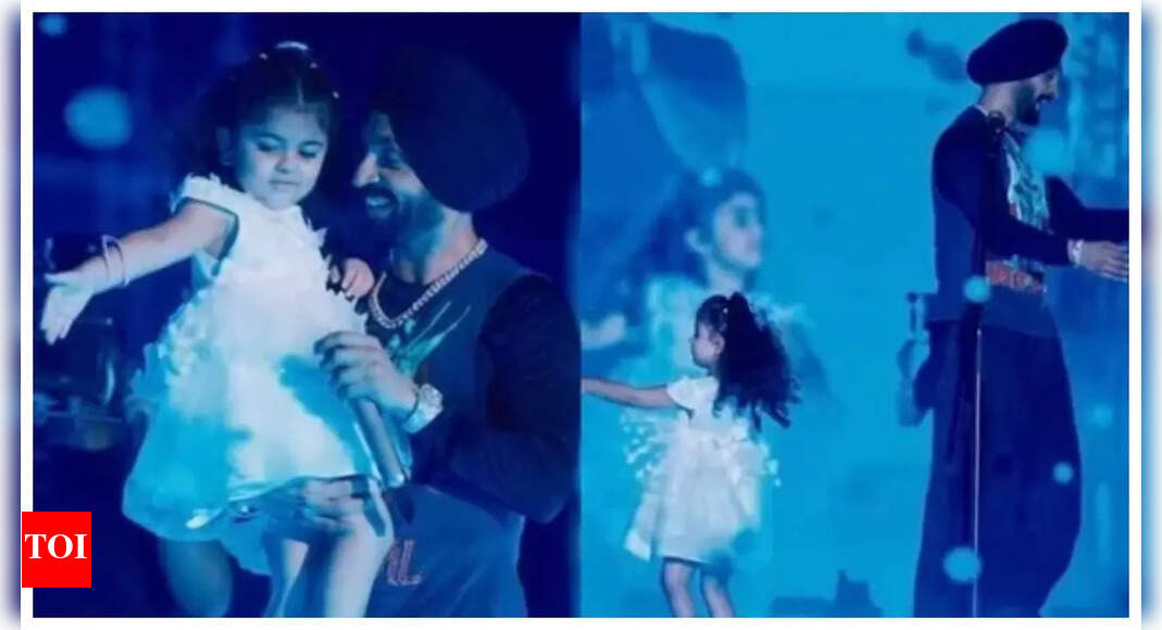 Diljit dances with a young fan; protects her on stage