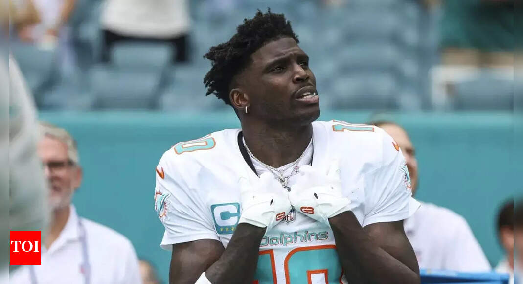 What happened to Tyreek Hill? Dolphins star carted off field and team's playoff hopes shaken