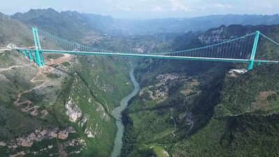 China unveils the world’s tallest bridge Huajiang Grand Canyon cutting a two hour journey to just two minutes