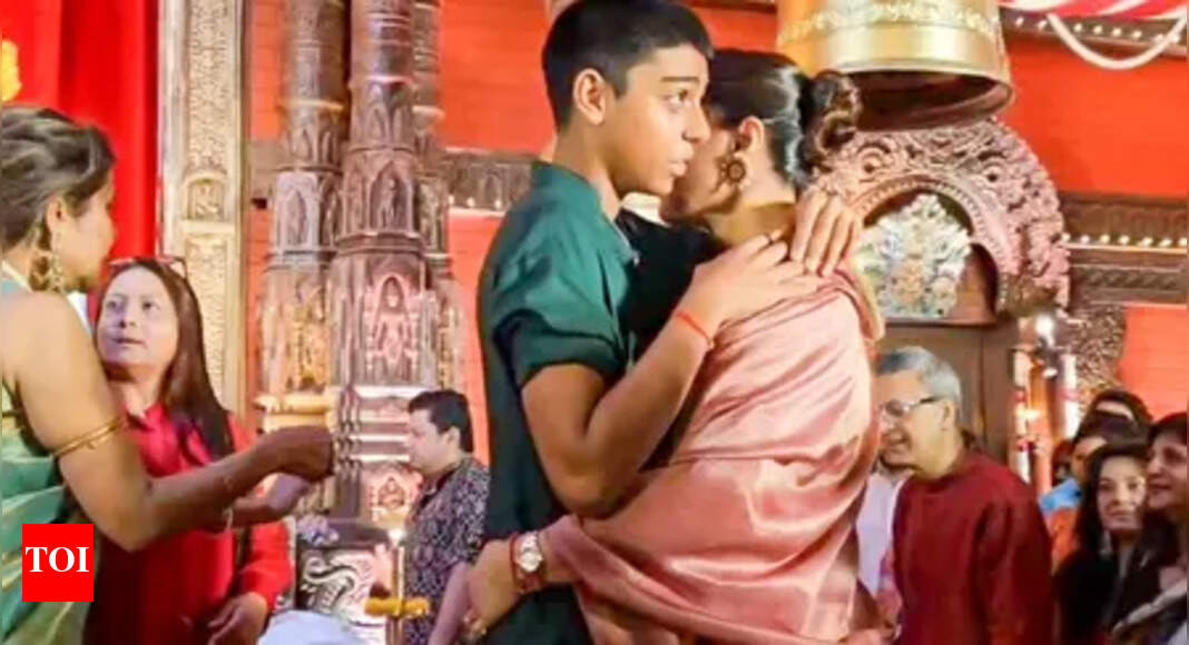 Kajol shares an emotional moment with son Yug at Durga Puja pandal