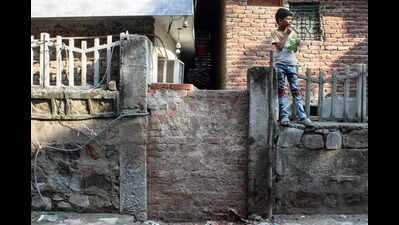 ‘No way out’: Families protest school wall blocking their doors