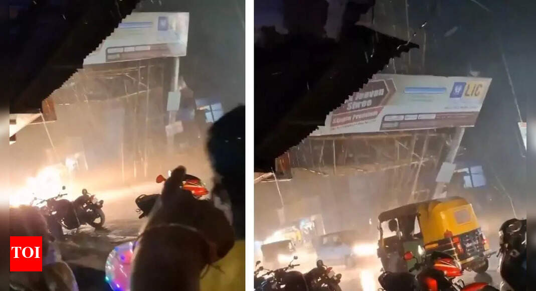 Auto-Rickshaw Driver Caught in Spine-Chilling Hoarding Collapse Video