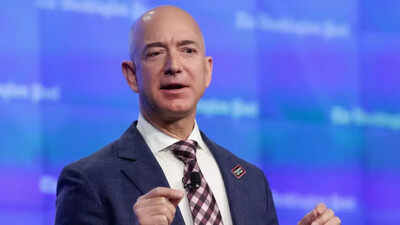 Amazon founder Jeff Bezos makes a rare public appearance at tech event, says: Millions of people will live in ...