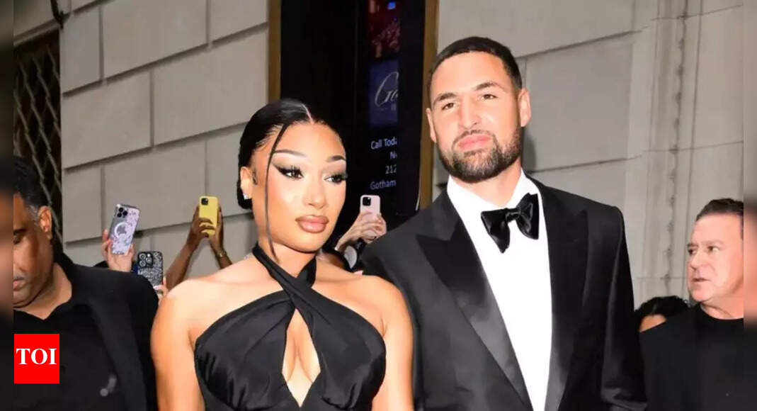 Megan Thee Stallion sends sweet cuddling shoutout to boyfriend Klay Thompson in a romance-filled montage