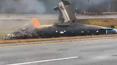  Small plane crashes onto Massachusetts highway, catches fire