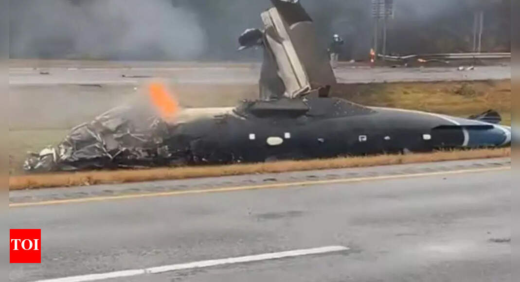 Watch: Small plane crashes onto Massachusetts highway, catches fire