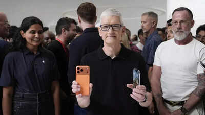Apple CEO Tim Cook gives an update on company's China plans; and China is 'happy' with it