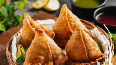 Viral video of man teaching students to eat samosa sparks furious online debate— here’s why