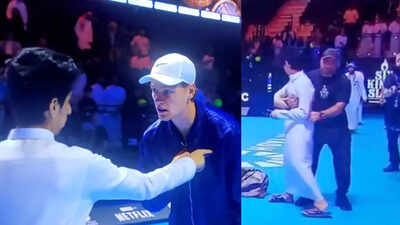  Jannik Sinner gives confused look to court invader, security whisks him away - watch video