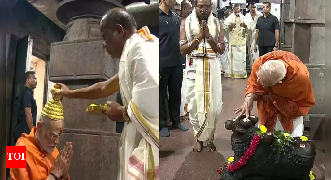Modi in Andhra: PM dons veshti, offers prayers at Srisailam Temple; to inaugurate key projects Modi in Andhra: PM dons veshti, offers prayers at Srisailam Temple; to inaugurate key projects