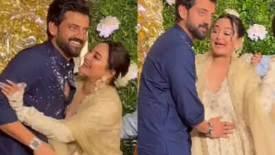 Zaheer Iqbal pokes fun at Sonakshi Sinha's pregnancy rumours by pretending to cradle her baby bump, don't miss her reaction - VIDEO