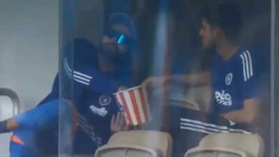Rohit Sharma and Shubman Gill caught munching popcorn during rain delay - WATCH