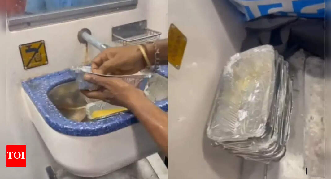 Viral video: Catering staff caught cleaning disposable food containers to reuse in train; fined Rs 5L
