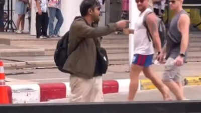  Major online shaming after Bangkok Police arrests Indian man who was threatening people with pistol-lighter, hurling abuses