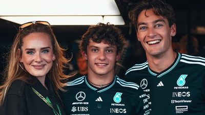 Adele returns to public eye at F1 US Grand Prix as she joins George Russell in Mercedes pit before Verstappen wins