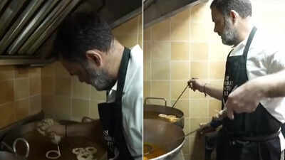  Rahul Gandhi tries his hand at making 'imarti', 'besan laddoo' at iconic Delhi shop - watch