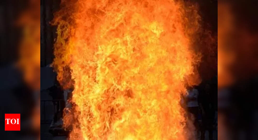 Bike with crackers explodes as lit fireworks land on it injuring 2 persons